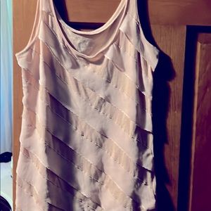 Small pink dressy tank top. Goes great under blazers.